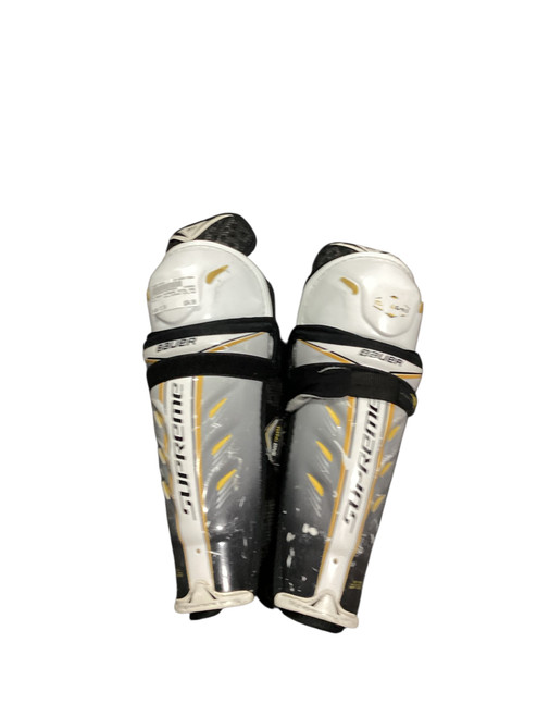 Vist Large View of Product Image Which is Used Bauer SUPREME TOTAL ONE Junior Shin Guards None 12"