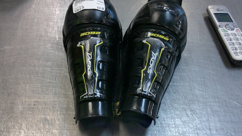 Vist Large View of Product Image Which is Used CCM TACKS Youth Shin Guards Black 8"