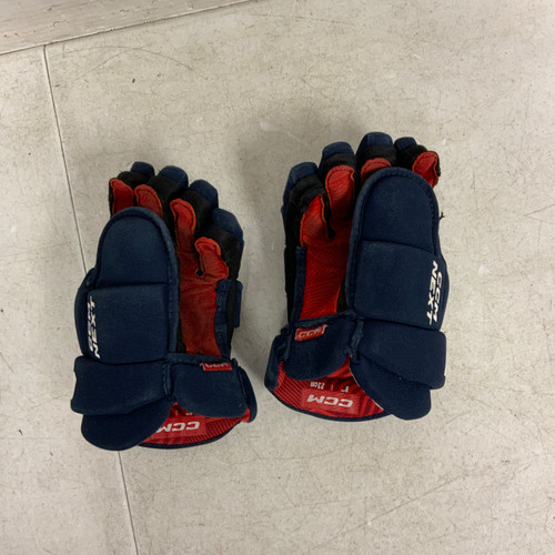 Vist Large View of Product Image Which is Used CCM NEXT Youth Gloves Navy Blue 9"