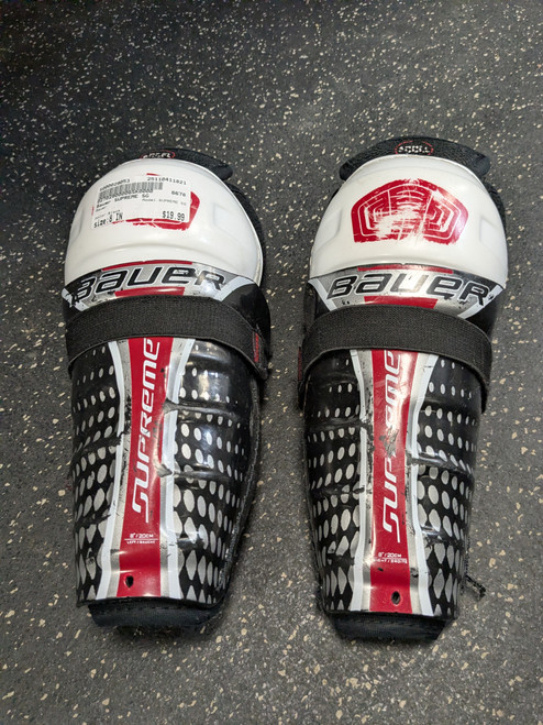Vist Large View of Product Image Which is Used Bauer SUPREME SG Youth Shin Guards Black 8"