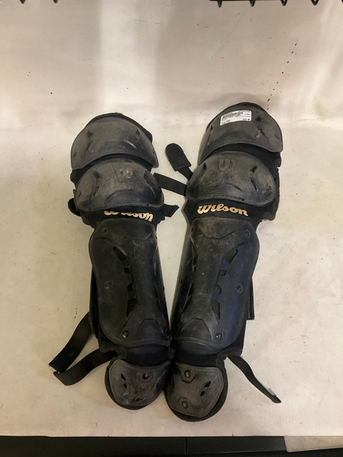 Vist Large View of Product Image Which is Used Wilson SHIN GUARDS Catchers Leg Guards Black Youth