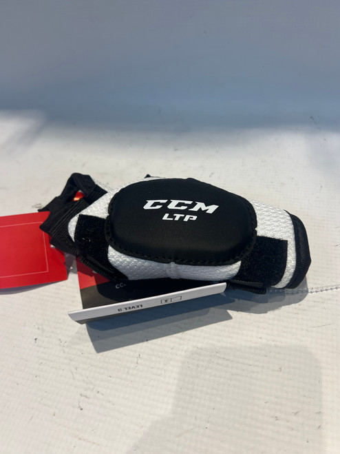 Vist Large View of Product Image Which is Used CCM LTP Youth Shin Guards White 9"