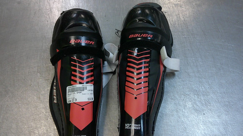 Vist Large View of Product Image Which is Used Bauer LIL SPORT Junior Shin Guards Black 10"