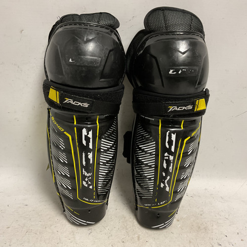 Vist Large View of Product Image Which is Used CCM TACKS 9040 Junior Shin Guards Black And Yellow 11"