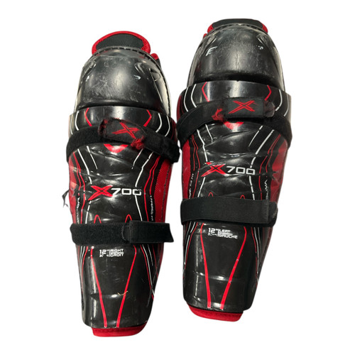 Vist Large View of Product Image Which is Used Bauer VAPOR X700 Junior Shin Guards Black 12"