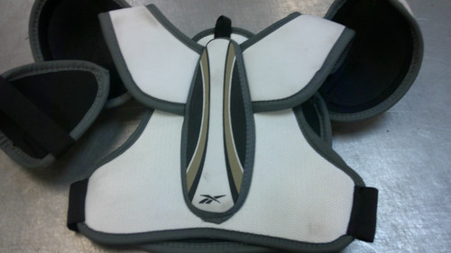Vist Large View of Product Image Which is Used CCM CROSBY Youth Shoulder Pads LG