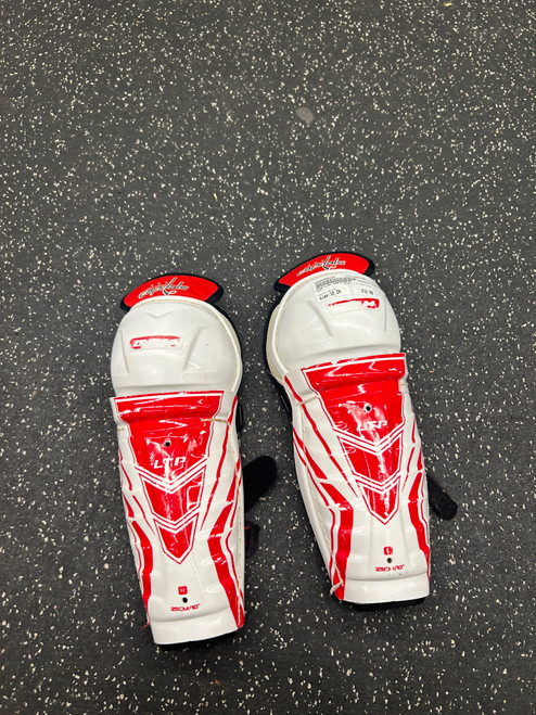 Vist Large View of Product Image Which is Used CCM LTP CAPITALS Youth Shin Guards White 10"