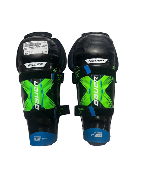 Vist Large View of Product Image Which is Used Bauer BAUER X SHIN GUARD Youth Shin Guards Black 9"