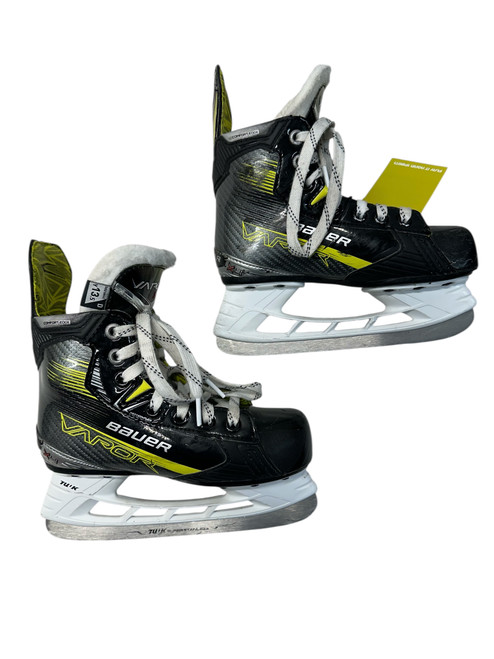 Vist Large View of Product Image Which is Used Bauer VAPOR X4 Youth Hockey Skate Black And Optic Yellow Youth 13.5