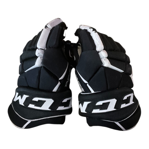 Vist Large View of Product Image Which is Used CCM TACKS 9040 GLOVES Junior Gloves Black 11"