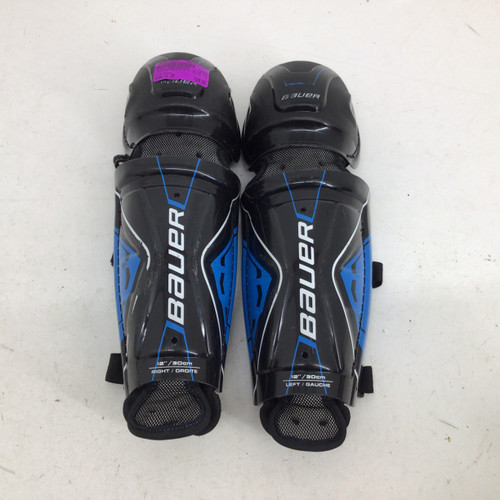 Vist Large View of Product Image Which is Used Bauer PERFORMANCE 12 IN SHIN GUARDS Junior Shin Guards Black 12"