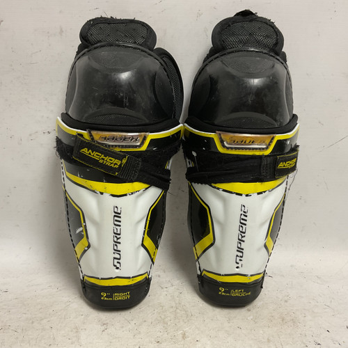 Vist Large View of Product Image Which is Used Bauer SUPREME 2S PRO Youth Shin Guards White/Black/Yellow 9"