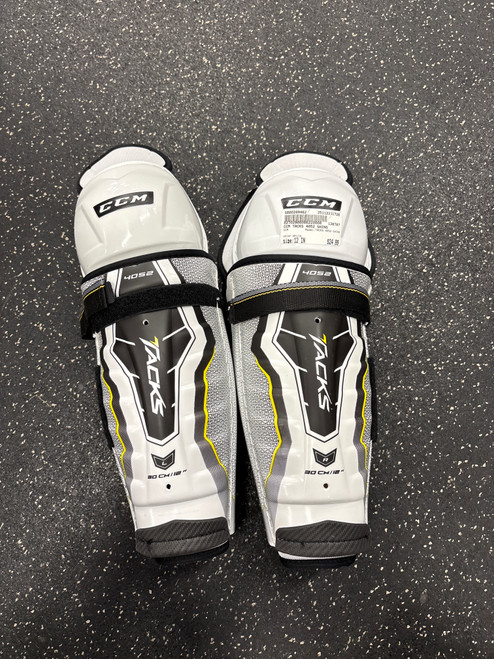Vist Large View of Product Image Which is Used CCM TACKS 4052 SHINS Intermediate Shin Guards White 12"