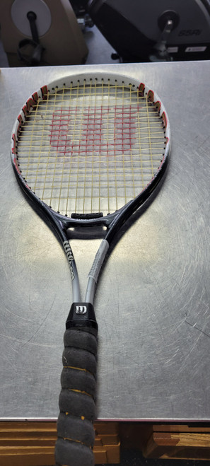 Vist Large View of Product Image Which is Used Wilson IMPACT Adult Tennis Racquet None 4 1/2"