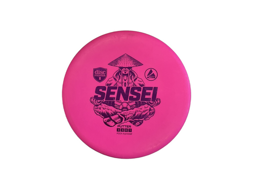Vist Large View of Product Image Which is Used Discmania SENSEI Disc Golf Putter Pink