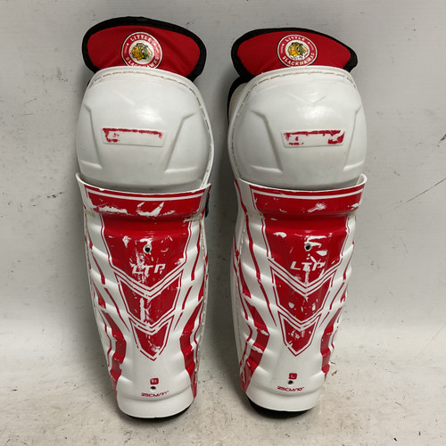 Vist Large View of Product Image Which is Used CCM LTP LITTLE BLACKHAWKS Junior Shin Guards White And Red 10"