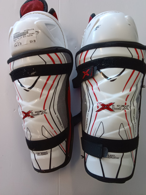 Vist Large View of Product Image Which is Used Bauer Senior Shin Guards White 13"