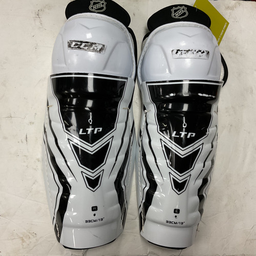 Vist Large View of Product Image Which is Used CCM LTP Junior Shin Guards White And Black 13"