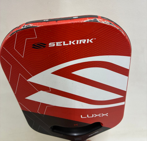 Vist Large View of Product Image Which is Used Selkirk LUXX Pickleball Racquet Red