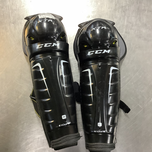 Vist Large View of Product Image Which is Used CCM XTK SHINGAURDS LRG Senior Shin Guards Black 16"