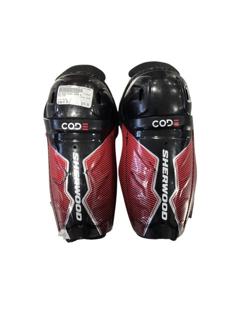 Vist Large View of Product Image Which is Used Sher-wood CODE Youth Shin Guards Black 8"
