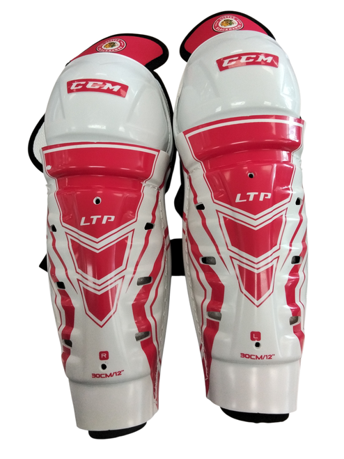 Vist Large View of Product Image Which is Used CCM LTP Junior Shin Guards White 12"