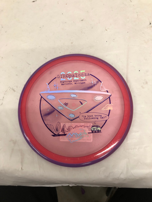 Vist Large View of Product Image Which is Used MVP PYRO Disc Golf Mid Range Pink 177g