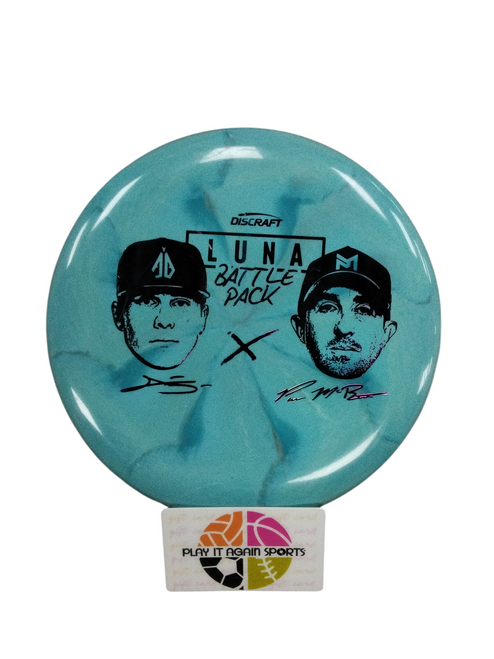 Vist Large View of Product Image Which is Used Discraft LUNA BATTLE PACK P. MCBETH Disc Golf Putter Carolina Blue