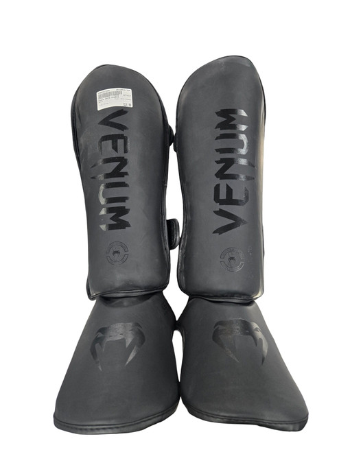 Vist Large View of Product Image Which is Used Venum SHIN GUARDS Boxing Pads Black