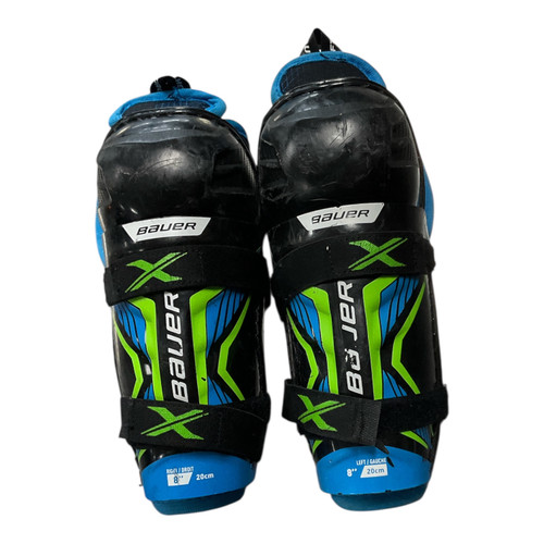 Vist Large View of Product Image Which is Used Bauer X Youth Shin Guards Black 8"