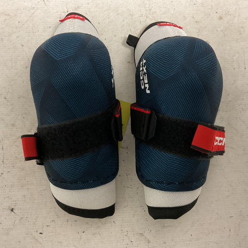 Vist Large View of Product Image Which is Used CCM NEXT Youth Elbow Pads Navy And White LG