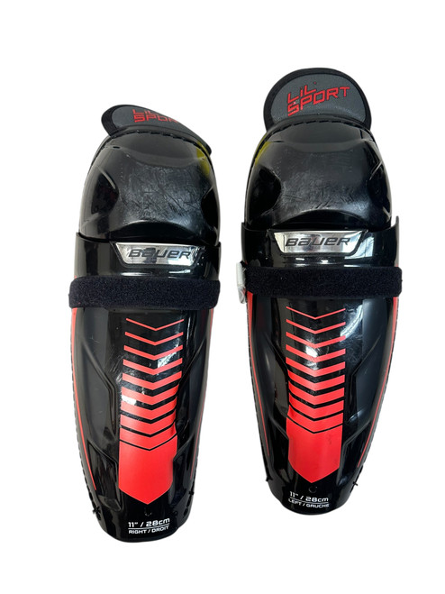 Vist Large View of Product Image Which is Used Bauer LIL SPORT Junior Shin Guards Black 11"