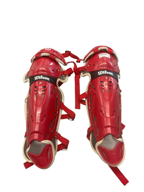 Vist Large View of Product Image Which is Used Wilson WTA4602 Catchers Leg Guards Red Intermed
