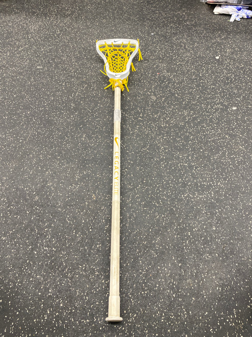 Vist Large View of Product Image Which is Used Nike LEGACY ELITE COMPLETE Wmn Atk/Mid Complete Stick White