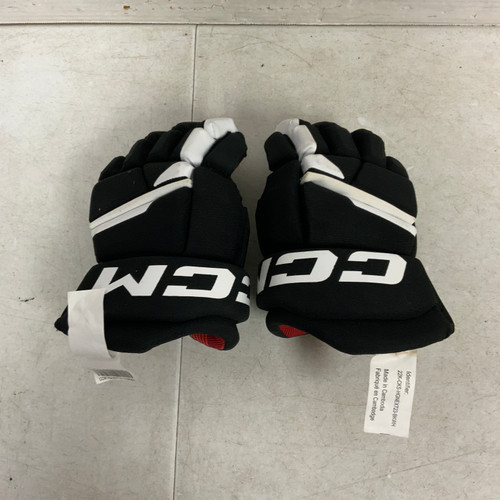 Vist Large View of Product Image Which is Used CCM NEXT Youth Gloves Black 10"