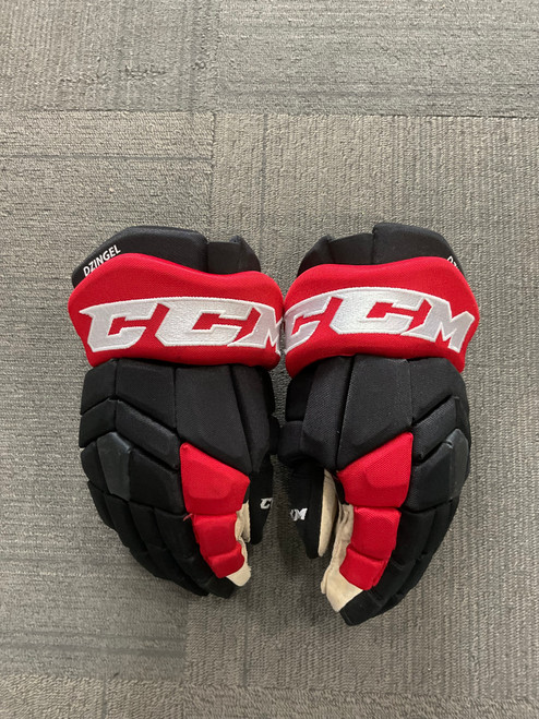 Vist Large View of Product Image Which is Used CCM PRO DZINGEL Senior Gloves Black And Red 14"