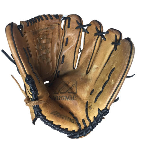 Vist Large View of Product Image Which is Used Mizuno MVT 1801 BB/SB Glove RH Throw Brown 13"
SKU