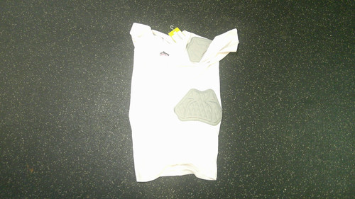 Vist Large View of Product Image Which is Used Schutt PADDED SHIRT FB Top Adult White SM