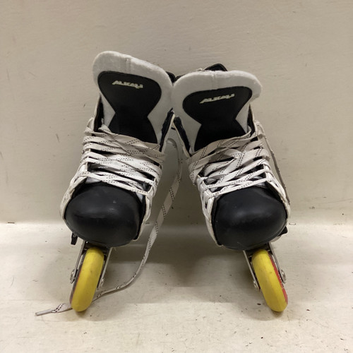 Vist Large View of Product Image Which is Used Alkali Roller Hockey Skates Yellow Adjustable