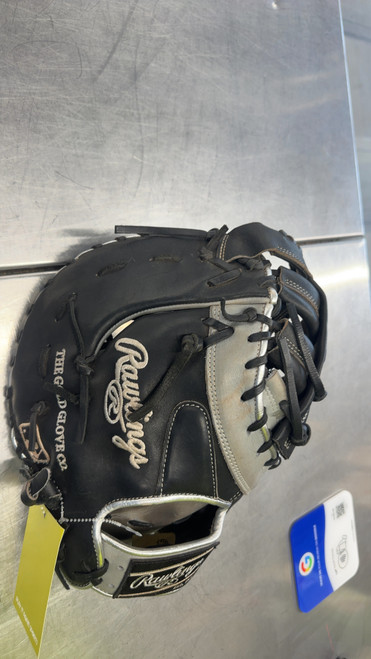 Vist Large View of Product Image Which is Used Rawlings HEART OF THE HIDE BB/SB First Base RH Throw Black And Grey 13"