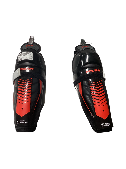 Vist Large View of Product Image Which is Used Bauer LIL SPORT Junior Shin Guards Black 9"