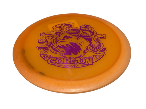 Vist Large View of Product Image Which is Used Innova Proto Color Glow Champion Gorgon Orange Disc Golf Driver 172g - Excellent