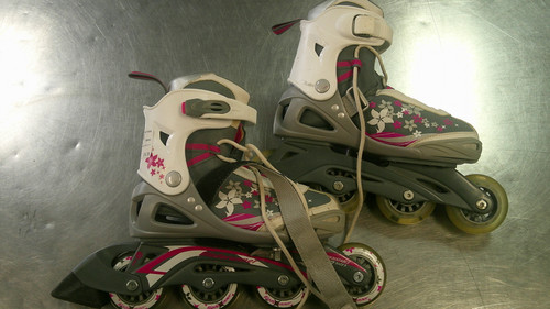 Vist Large View of Product Image Which is Used Bladerunner ADJ 4-7 Child Roller Quad Skates White Adjustable