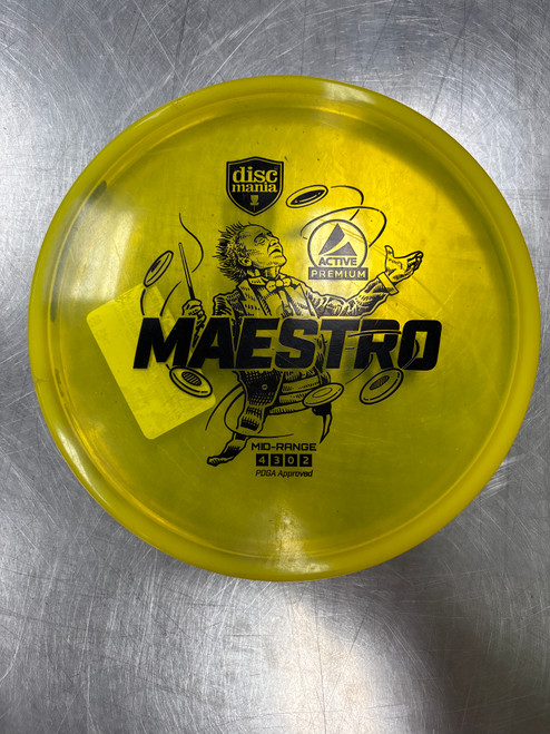 Vist Large View of Product Image Which is Used Discmania ACTIVE PREMIUM MAESTRO Disc Golf Mid Range Yellow
