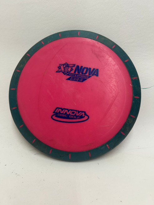 Vist Large View of Product Image Which is Used Innova XT NOVA Disc Golf Putter Pink
