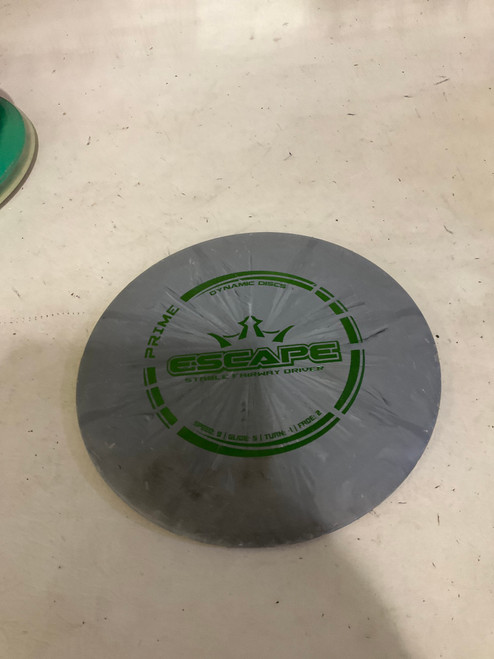 Vist Large View of Product Image Which is Used Dynamic Discs ESCAPE Disc Golf Mid Range Grey