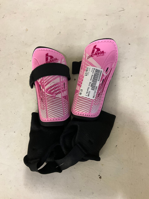 Vist Large View of Product Image Which is Used Brava Soccer Shin Guards Junior Pink S/M