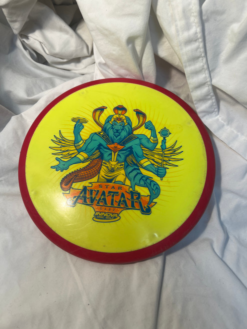 Vist Large View of Product Image Which is Used Innova STAR AVATAR Disc Golf Mid Range Yellow