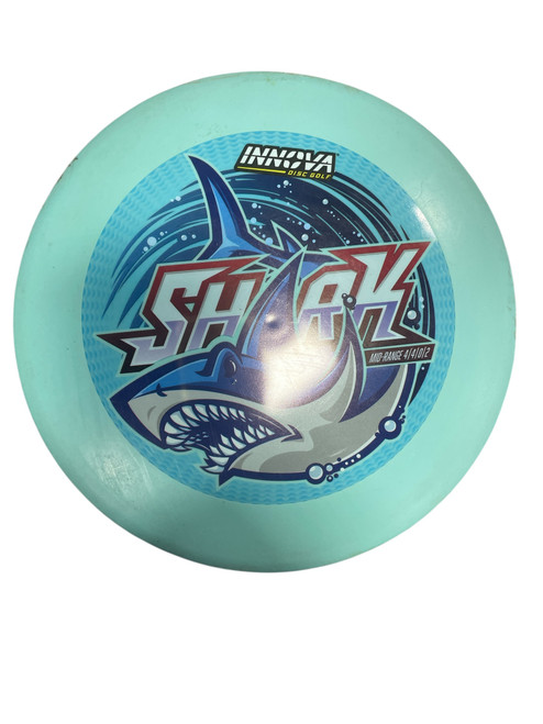 Vist Large View of Product Image Which is Used Innova DX SHARK Disc Golf Mid Range Carolina Blue