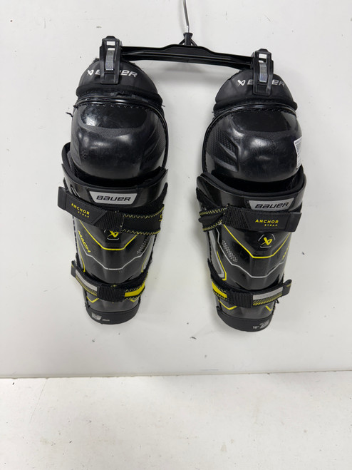 Vist Large View of Product Image Which is Used Bauer SUPREME MACH Youth Shin Guards Black 10"